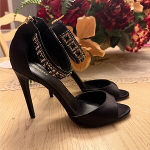 Express Black Heels with Gold Embellishments